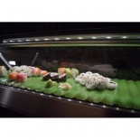 Hoshizaki 71" Left Side Condenser Curved Glass Refrigerated Sushi Display Case HNC-180BA-L-SLH 